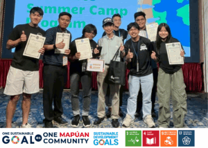 Group of students holding certificates at a summer camp event celebrating achievements and sustainability goals