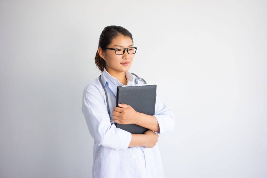 young asian female doctor holding folder | Mapúa Malayan Colleges Mindanao Young asian female doctor holding folder