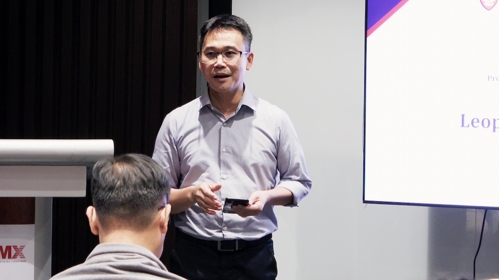 Mr Leopoldo d Aquino jr  director of the office for corporate partnerships and alumni affairs formally presents the newly appointed college and high school alumni association officers