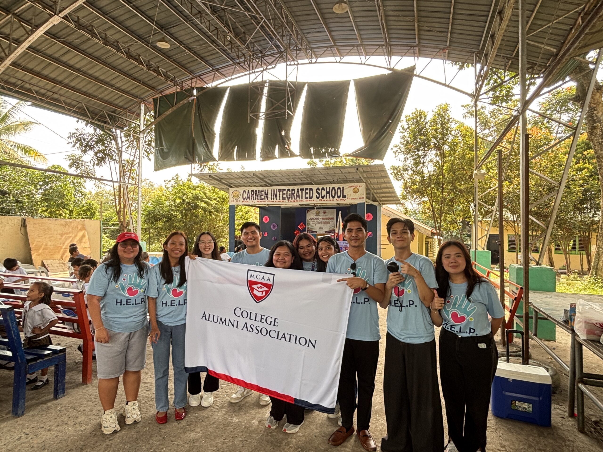Featured photo | Mapúa Malayan Colleges Mindanao Officers and volunteers of the mapúa mcm college alumni association gather at carmen integrated school in support of the alumni led program h e l p and its 55 grade 1 beneficiaries