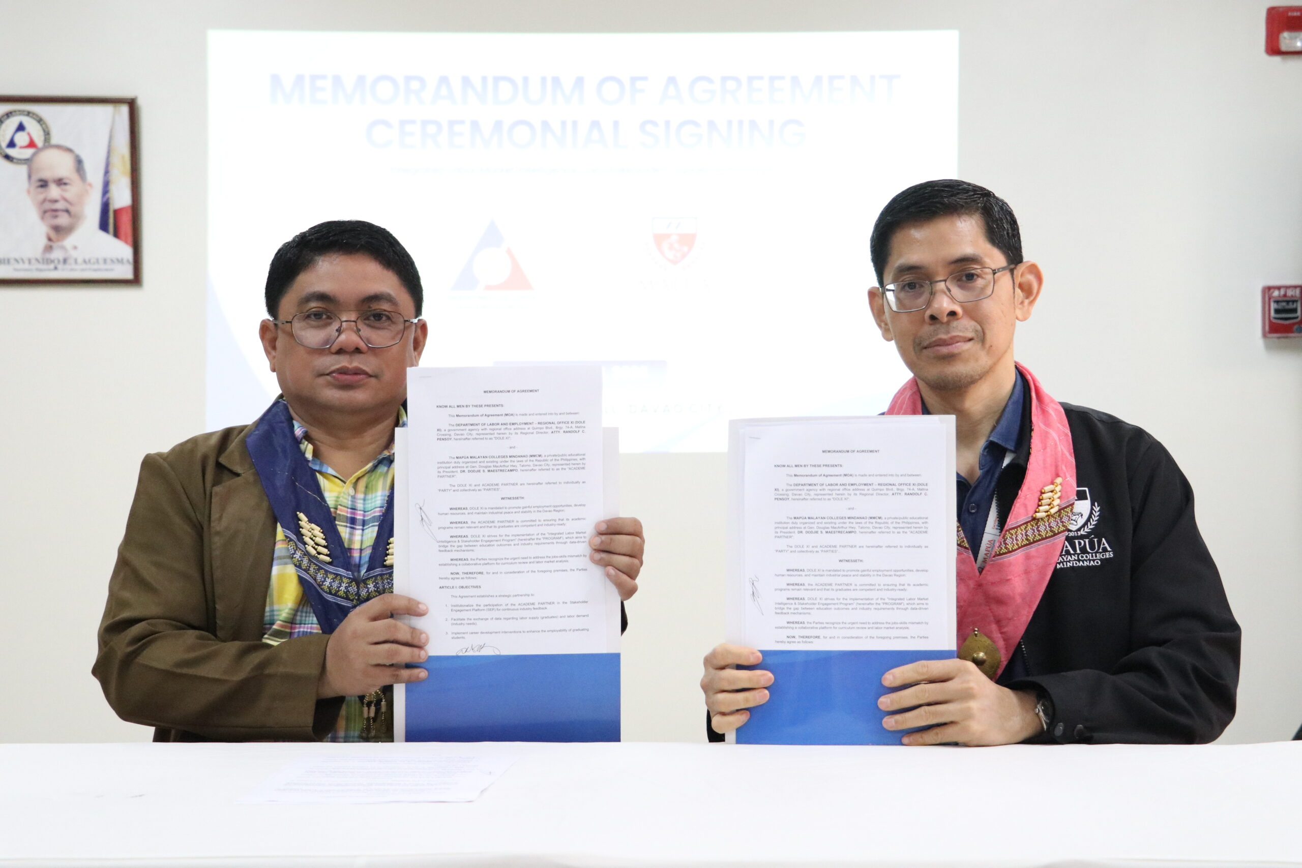IMG_7068 | Mapúa Malayan Colleges Mindanao Mapúa mcm evp coo engr alejandro h ballado jr with dole xi regional director atty randolf c pensoy regional director holding the signed memorandum of agreement